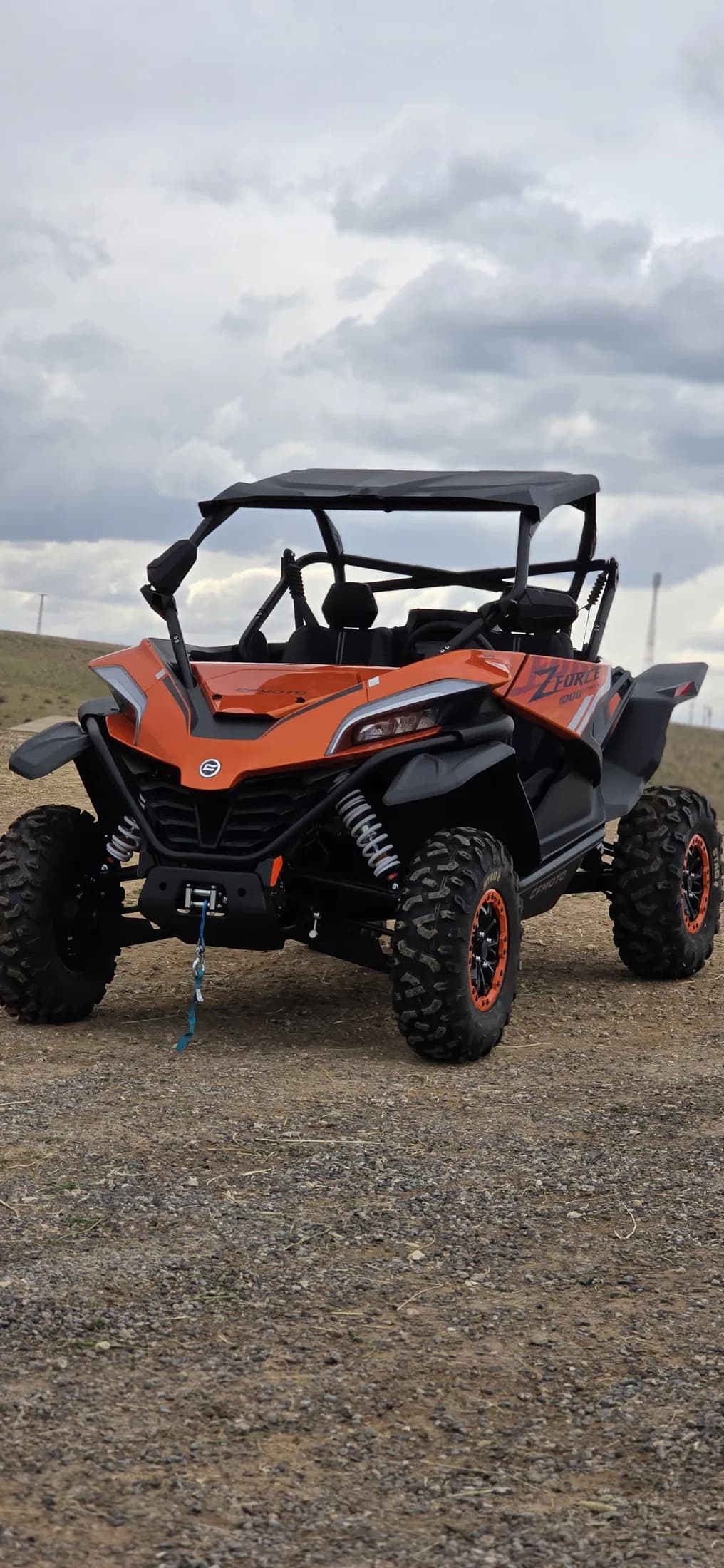 Close-up of an orange off-road buggy parked in the Agafay Desert